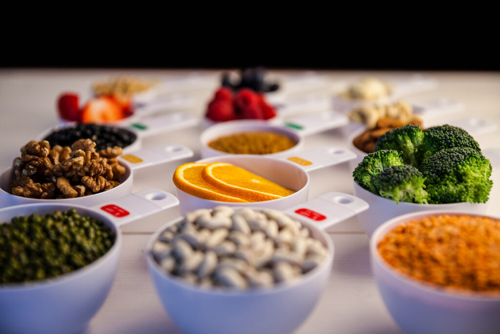 A table with bowls of food on it