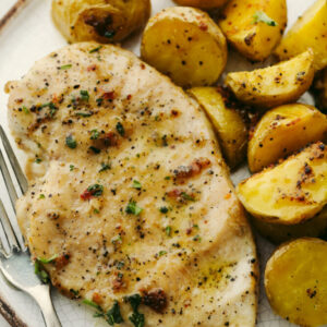 A plate of food with potatoes and meat.